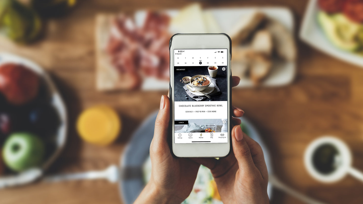 An iPhone that shows someone looking at the Centr app meal plan.