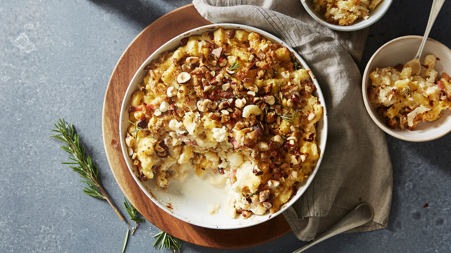 An overhead photo of a bowl of Centr's  Cauliflower & Bacon Mac & Cheese ready for eating.