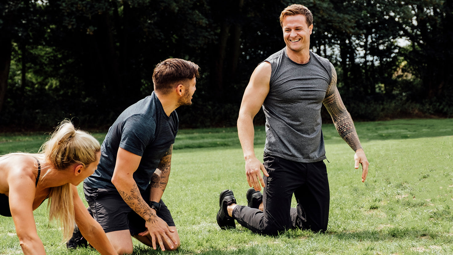 Bobby Holland Hanton exercises outside with Luke Zocchi and Tiffiny Hall.