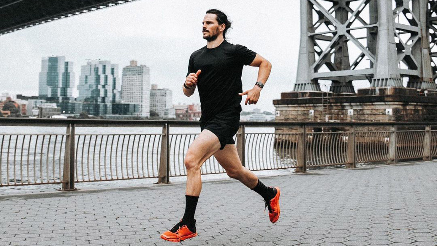 Dan Churchill runs by the Hudson River while training for the New York City Marathon. Photo credit: