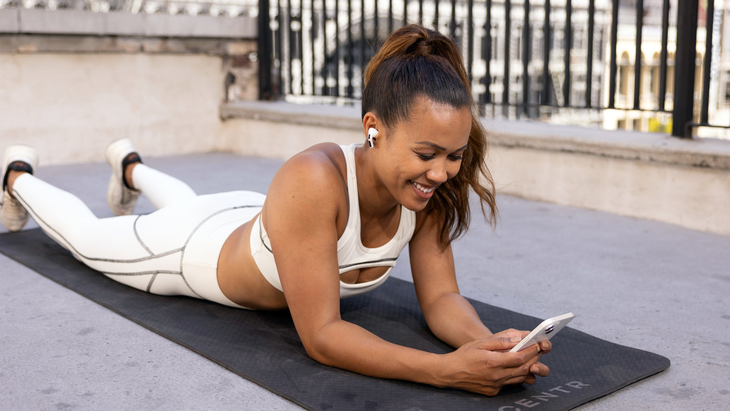 Centr Trainer Maricris Lapaix chills out on the exercise mat after a hard workout.