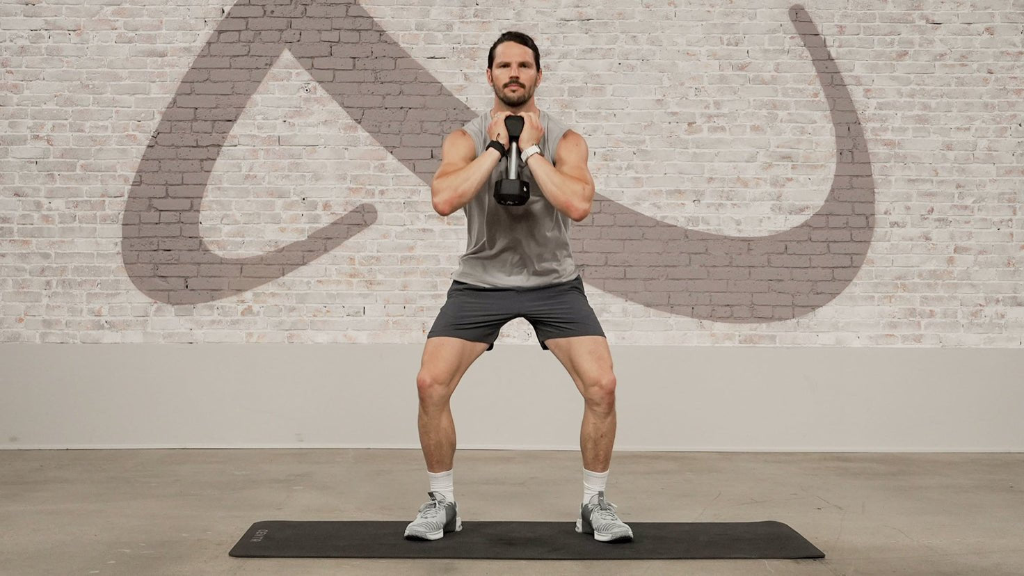 Tutorial: Dumbbell pop squat + press - Centr